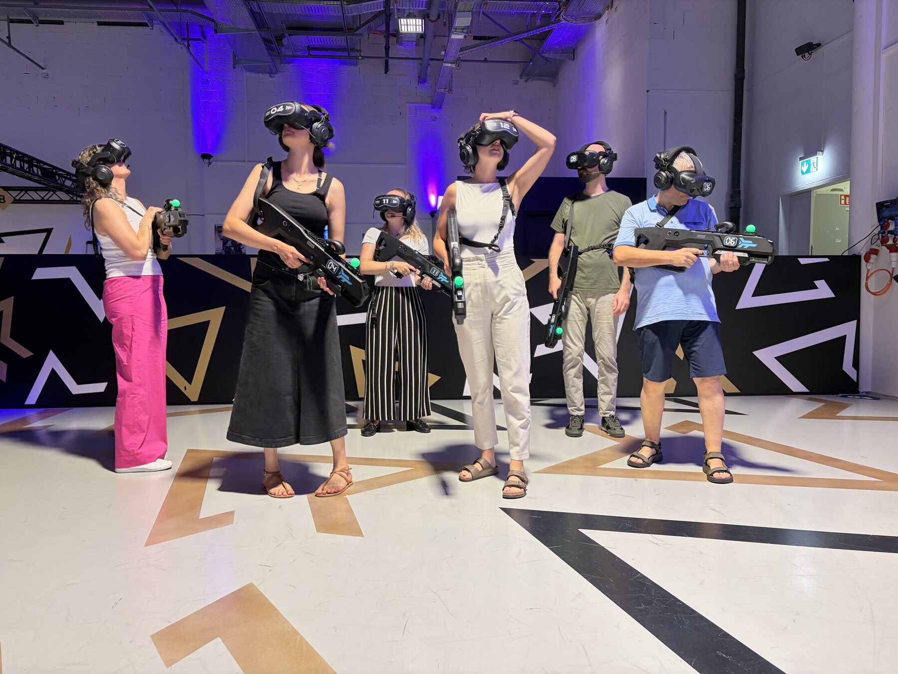 Colleagues enjoying a team event at VR City
